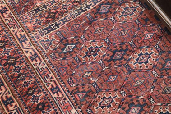 A Bokhara rug with traditional all-over panelled design, 150cm x 145cm